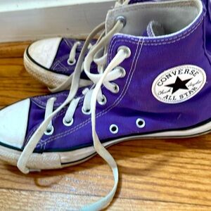 Purple converse high tops